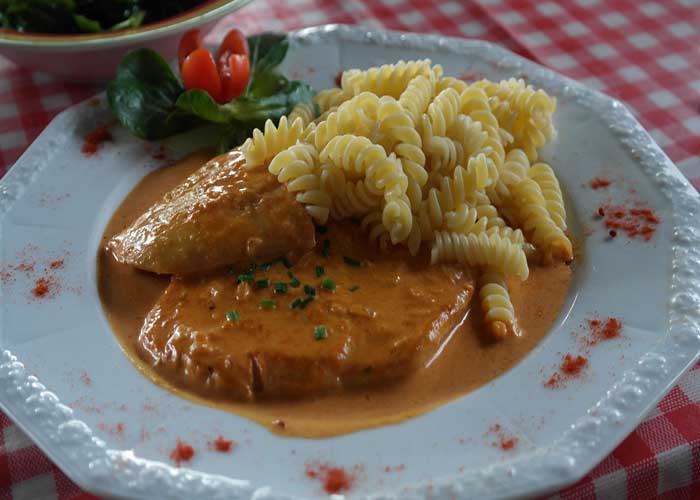 Carne de ternera o cerdo a la granadina